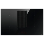 plīts virsma ar tvaika nosūcēju